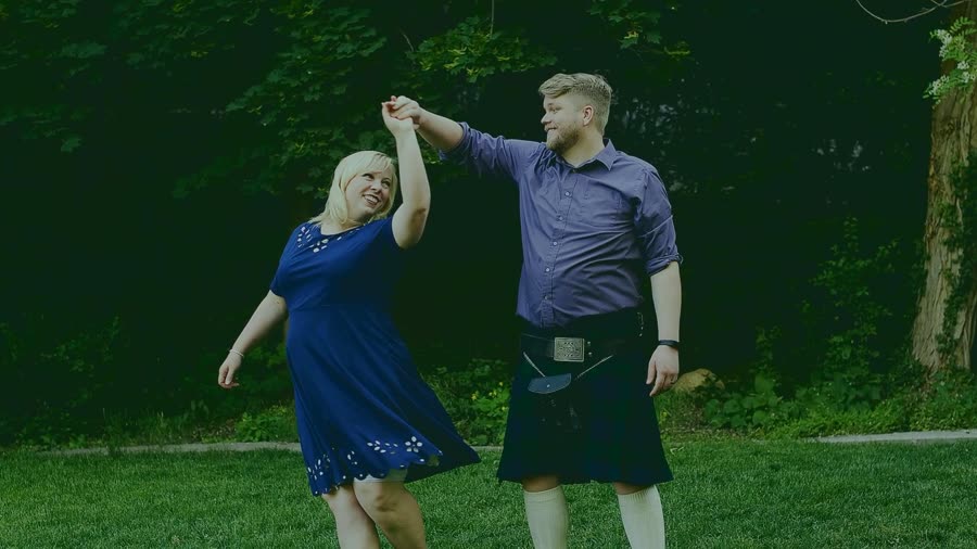 Will and his wife dancing together on the lawn